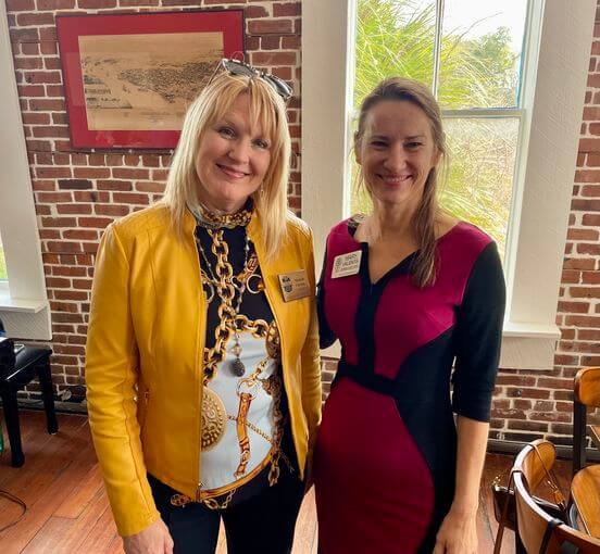 Michelle Christie (left) at a local Chamber of Commerce event with a fellow Rotarian.